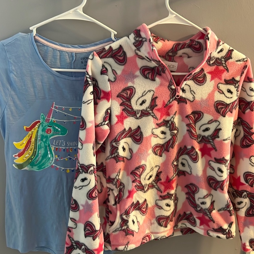 Two pack unicorn. One is a t shirt. And one is a sweatshirt material pull over.